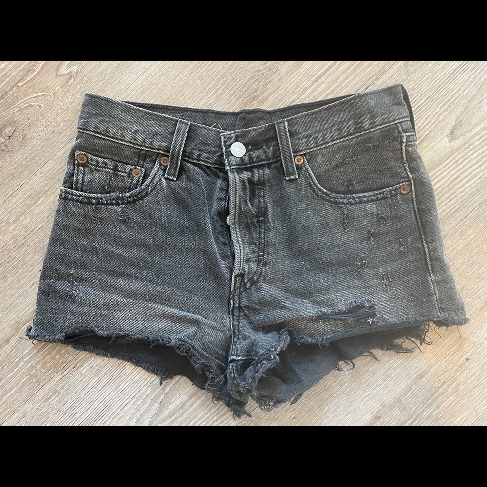 Levi’s high waisted black distressed shorts